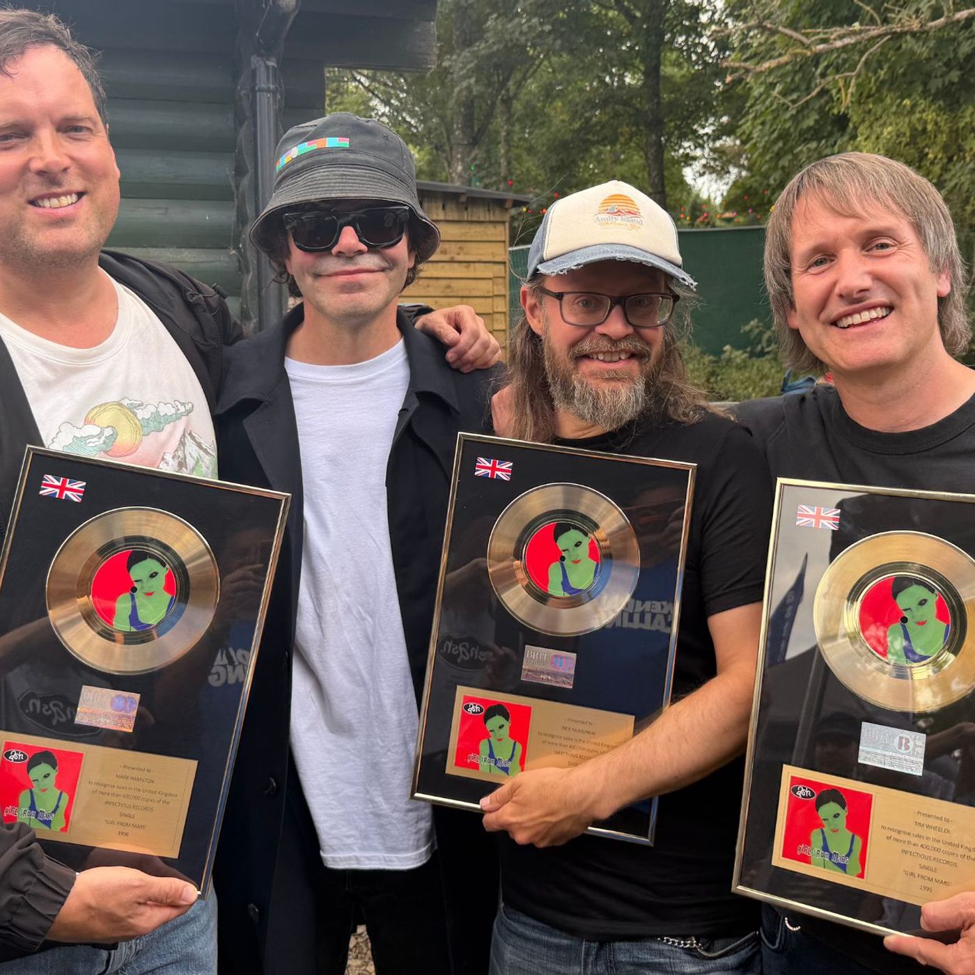 Ash surprise fans at Kendal Calling by performing as tribute band before being presented with gold discs for ‘Girl From Mars’