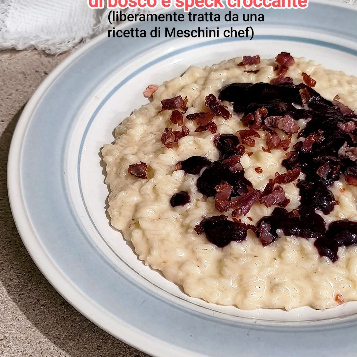 Risotto con taleggio, frutti di bosco e speck croccante