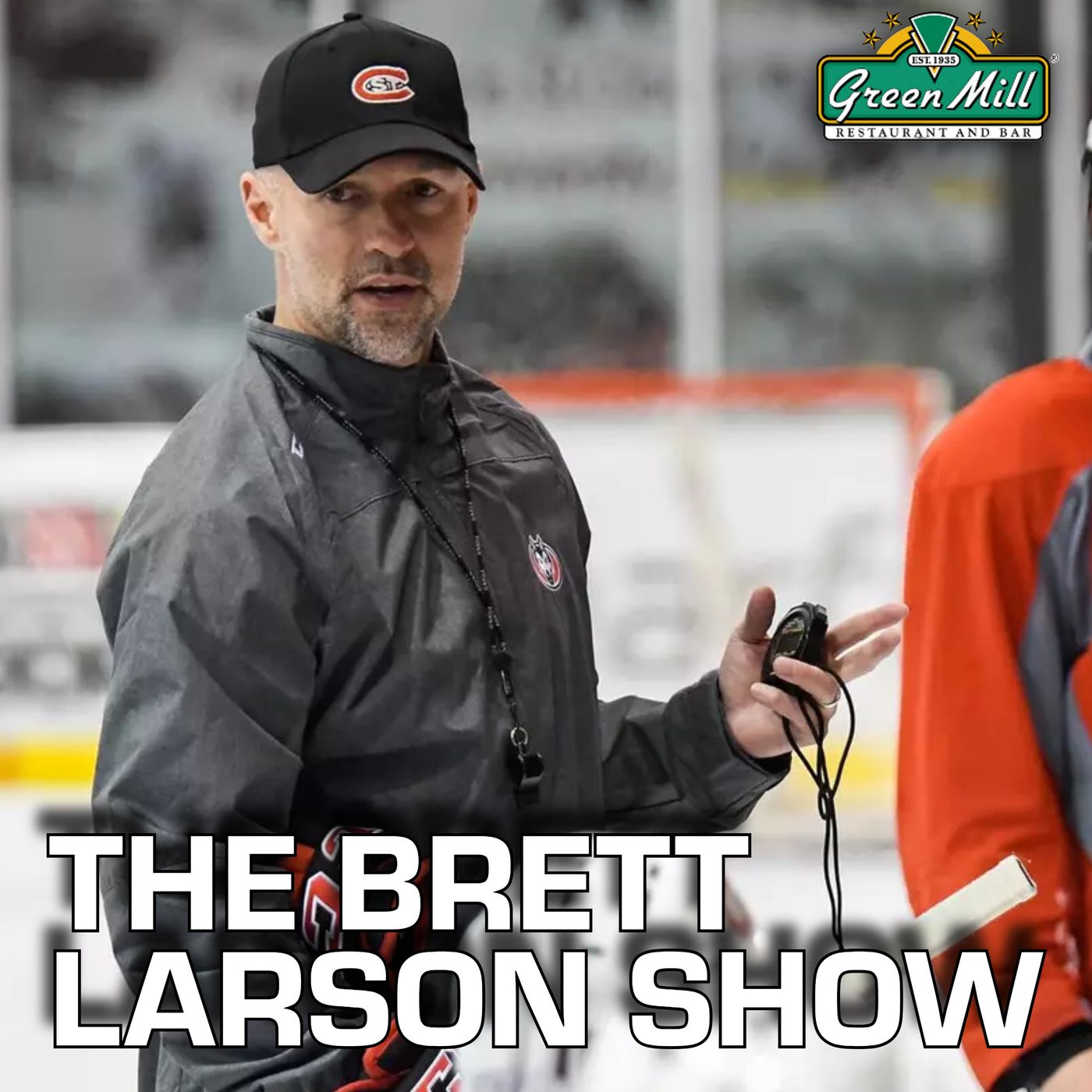 Coach Brett Larson and former three-time team captain Spencer Meier