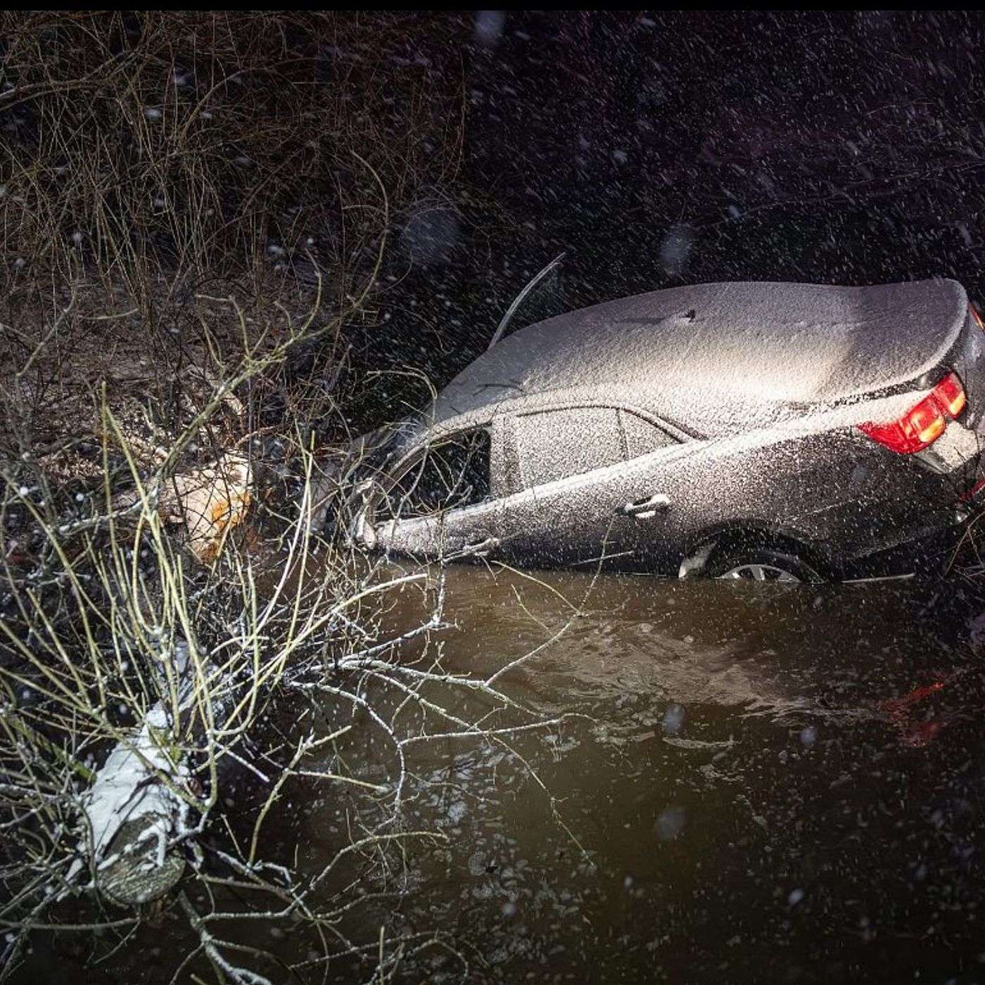 Car slides into creek near Harvard as blizzard warning takes effect late Sunday episode artwork