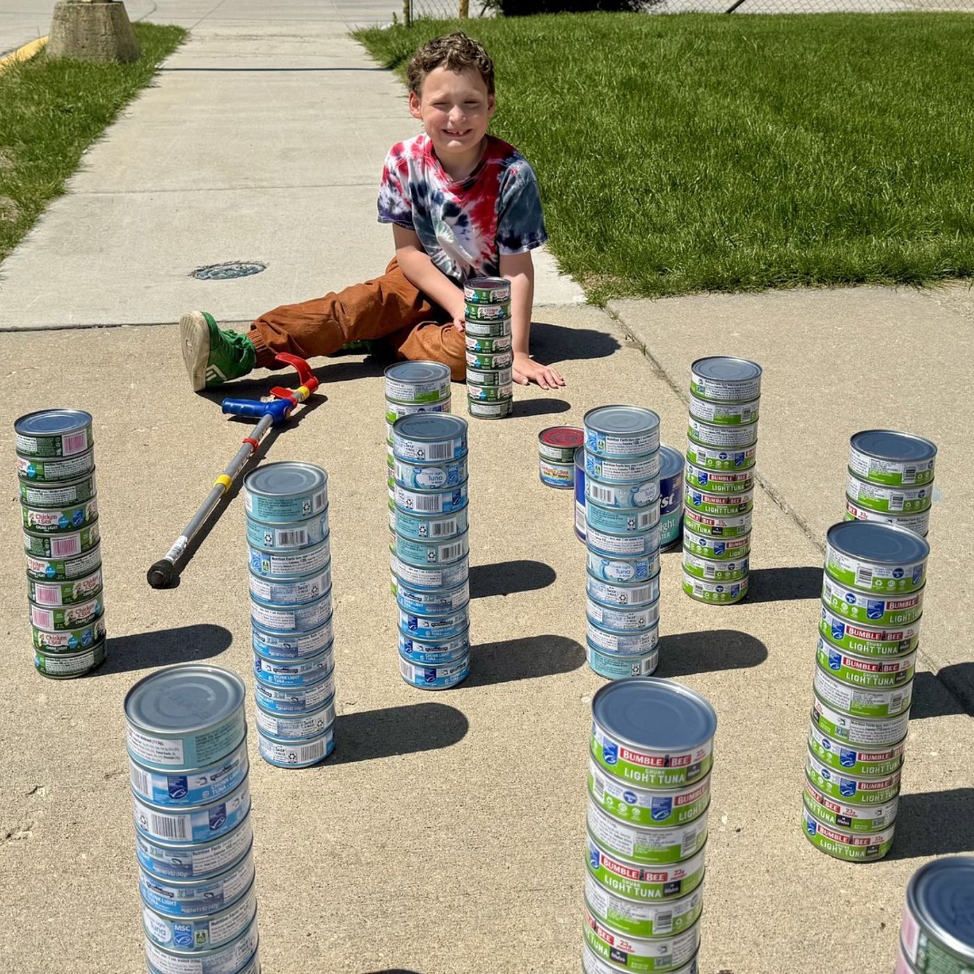 Marseilles boy again collecting tuna for the Marseilles Food Pantry episode artwork