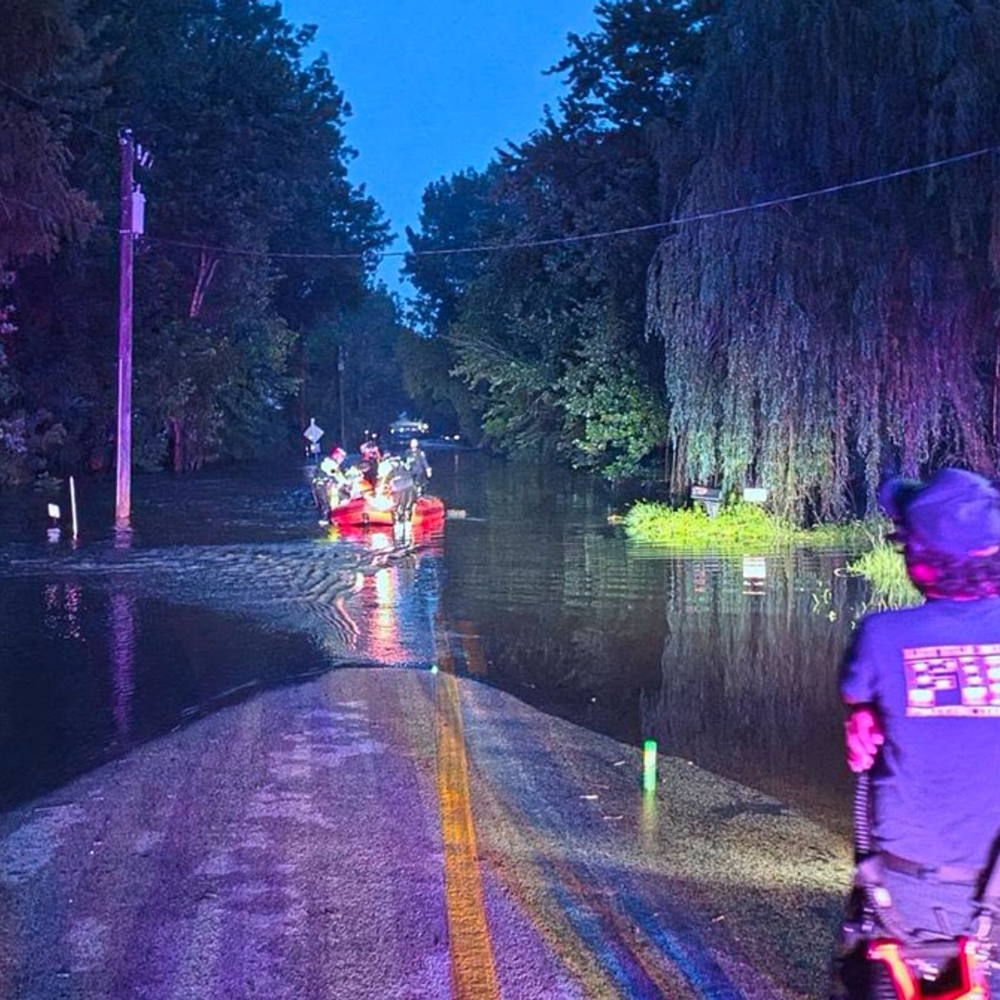 Fire crews help people escape homes near Plano as floodwaters endanger homes episode artwork