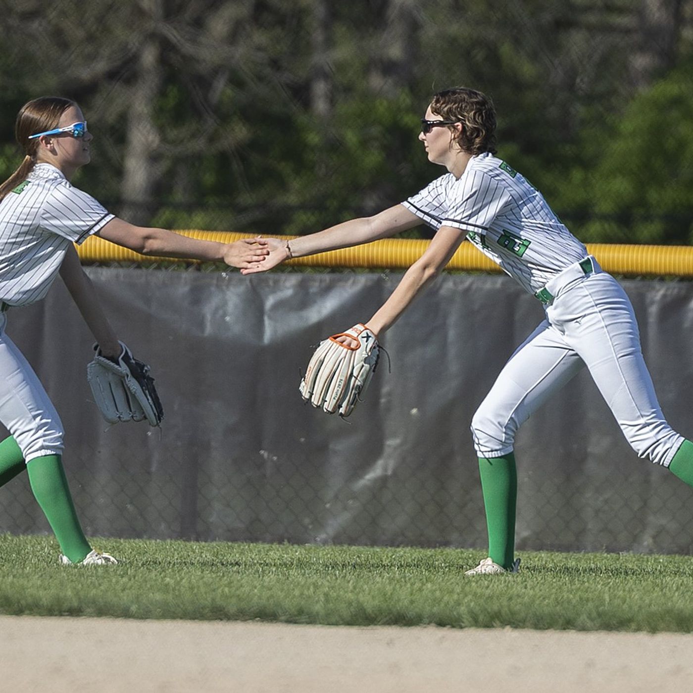 After recovering from rare bone cancer, Madi Eikenberry is leading Rock Falls softball at the plate episode artwork