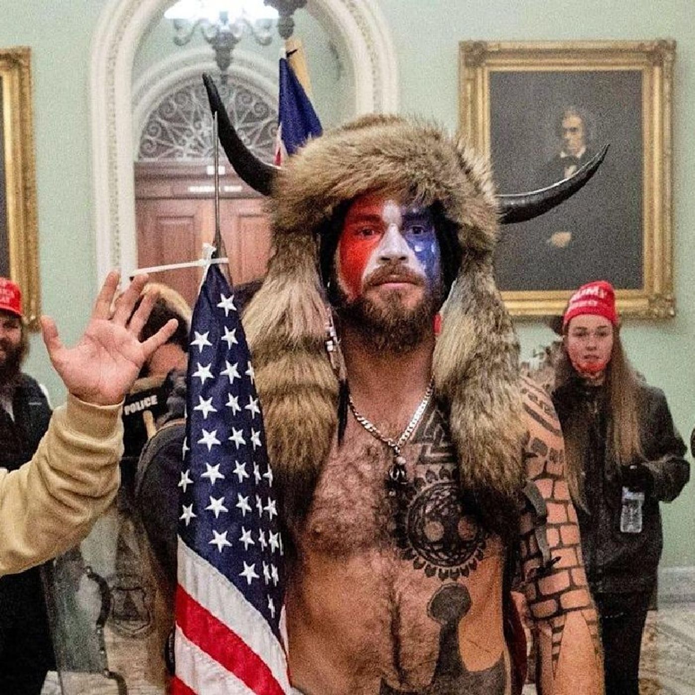 Episode 1379 - 'QAnon Shaman' Faces More Than Four Years in Prison After Pleading Guilty episode artwork