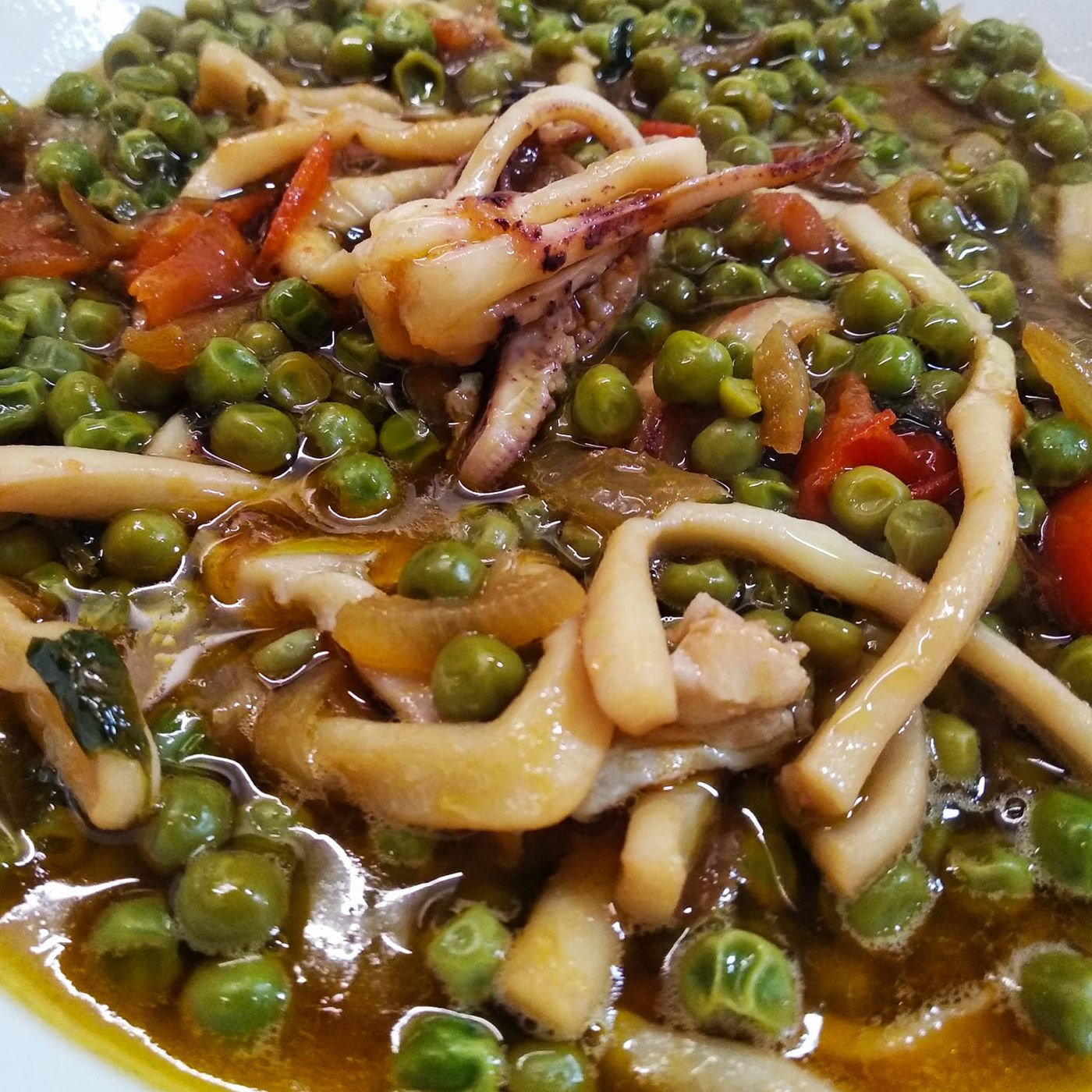 Calamari con piselli in umido: ricetta facile e veloce episode artwork