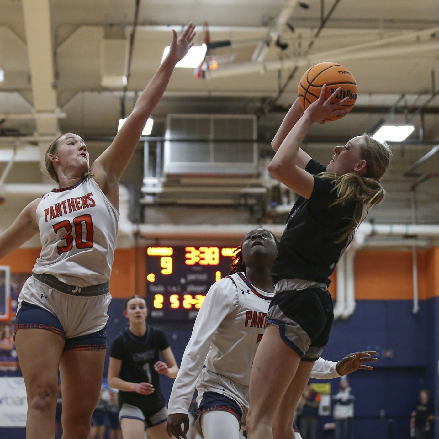 Oswego East girls blank crosstown rival Oswego in second quarter for 49-30 victory
