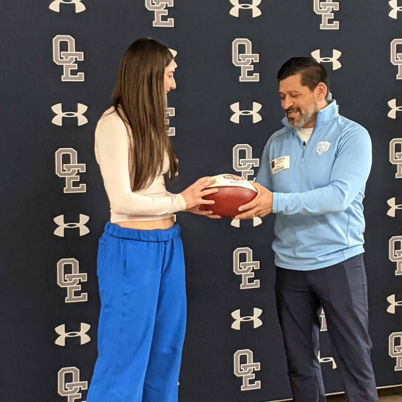 Chicago Bears present Oswego East’s flag football quarterback with community award
