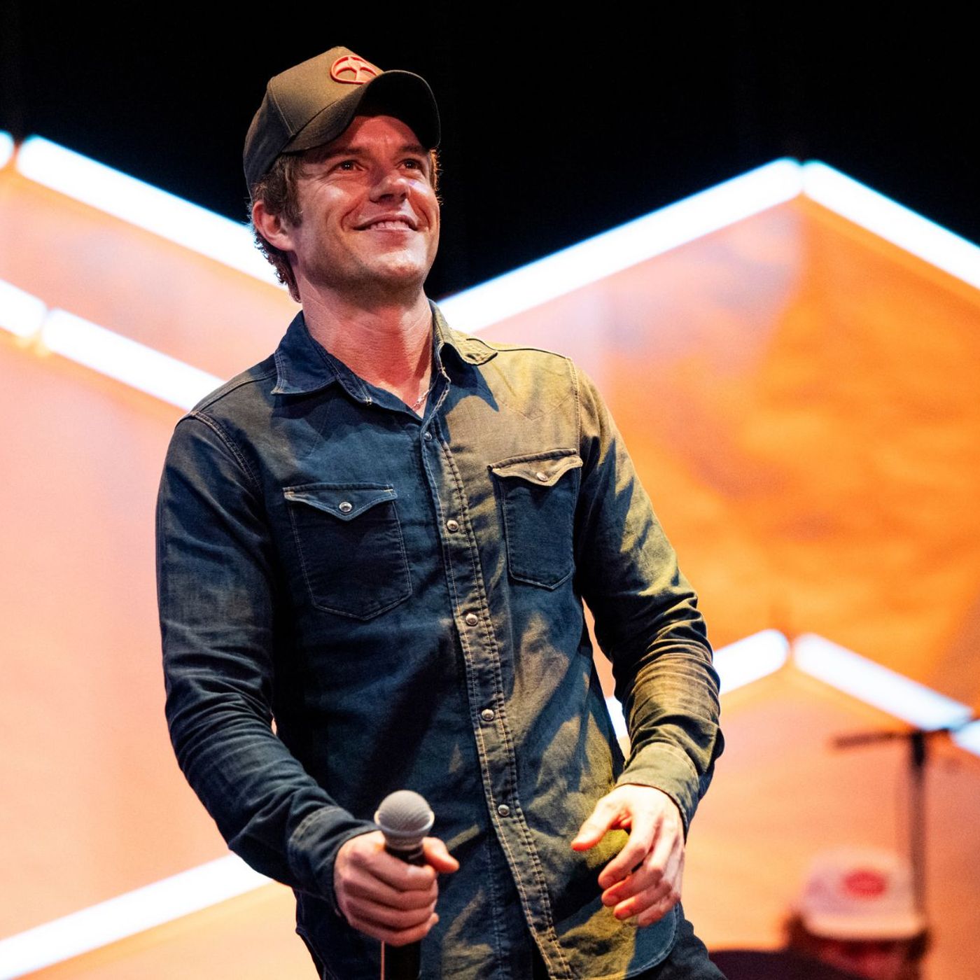 Brandon Flowers on which of his solo tracks “would’ve been a large Killers song” episode artwork