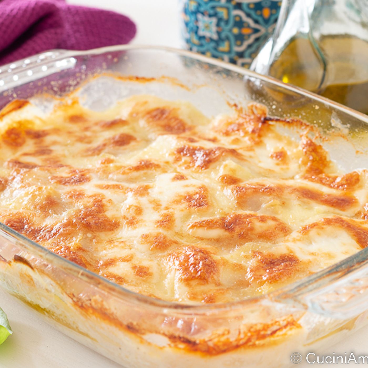 Parmigiana di patate con prosciutto e formaggio