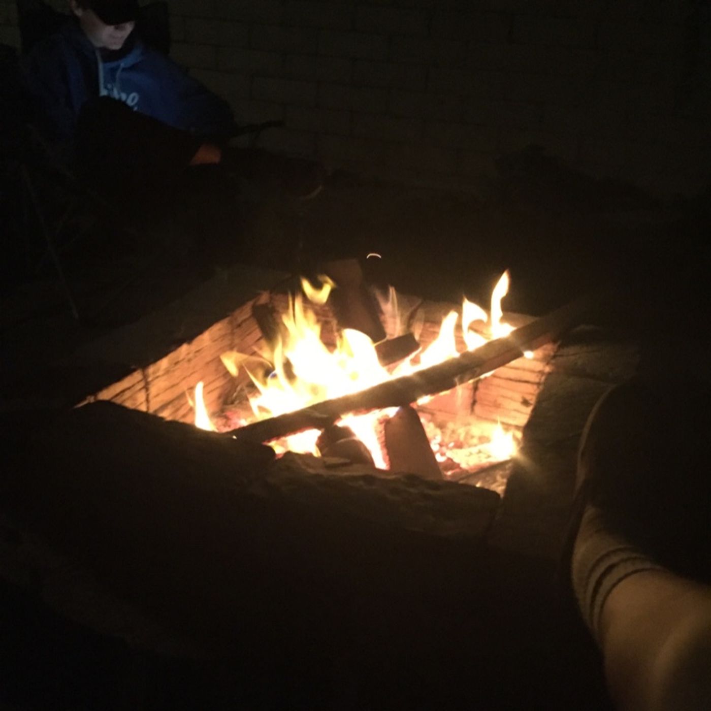 13 year old kids around a campfire