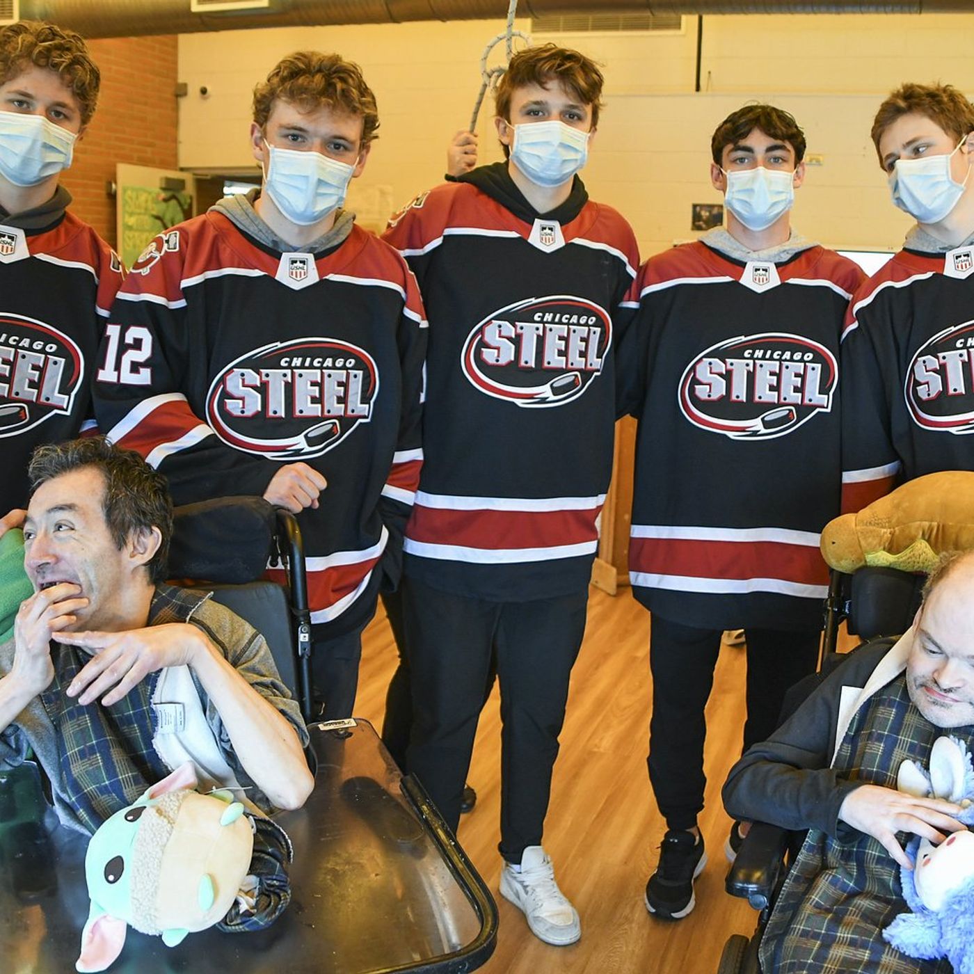 Chicago Steel visits Geneva Marklund with teddy bears