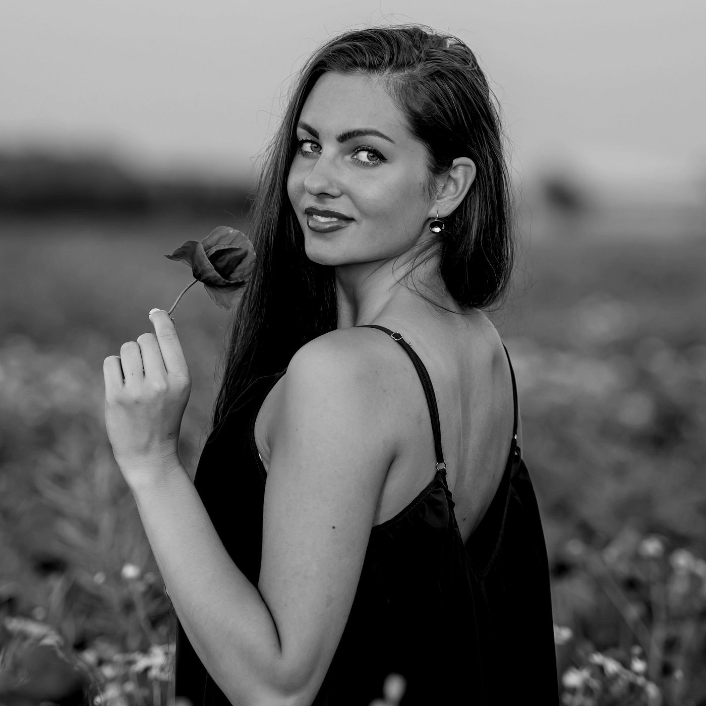 La Mujer y Las Flores