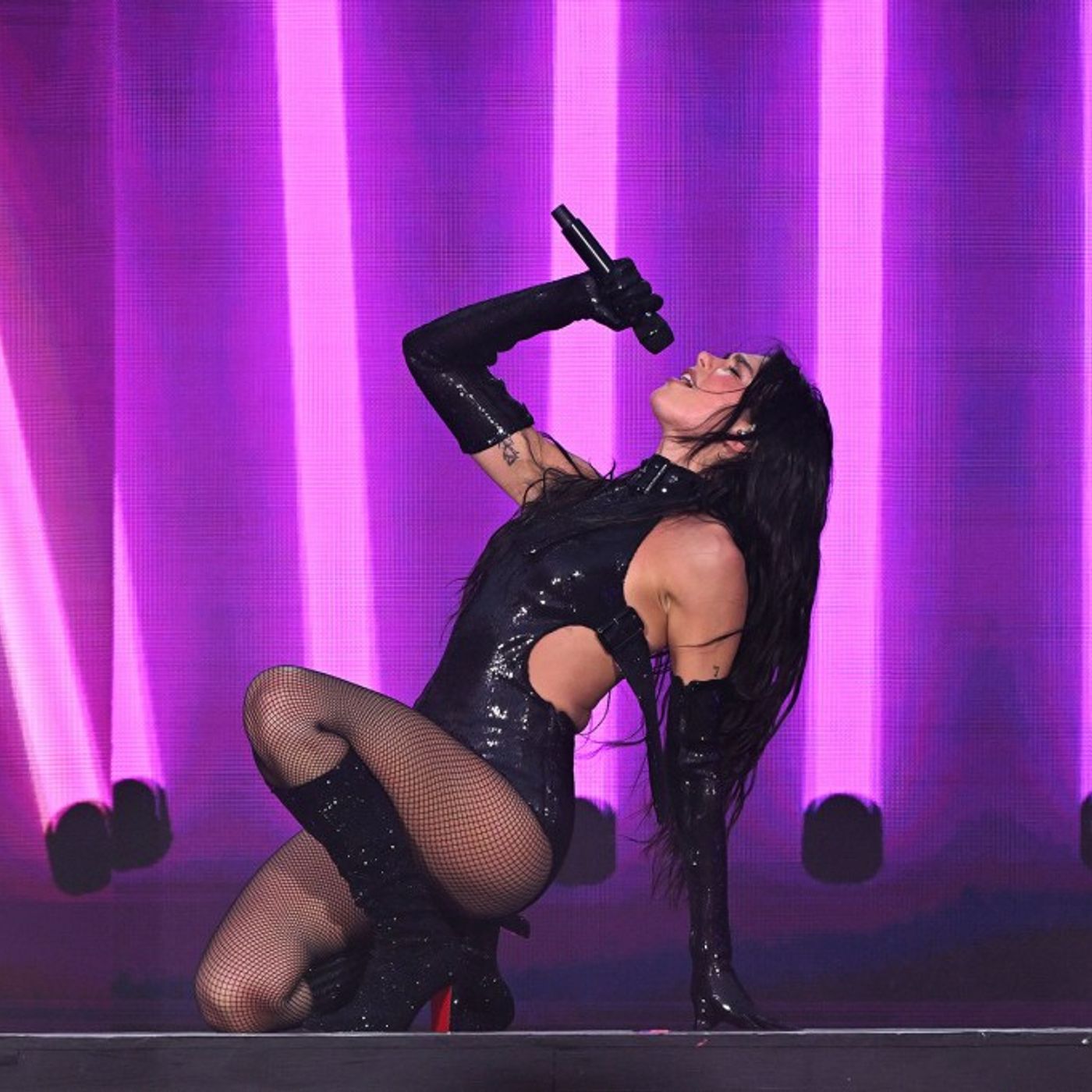 Dua Lipa’s Merch Supplier Sues Over Counterfeits at Radical Optimism Tour