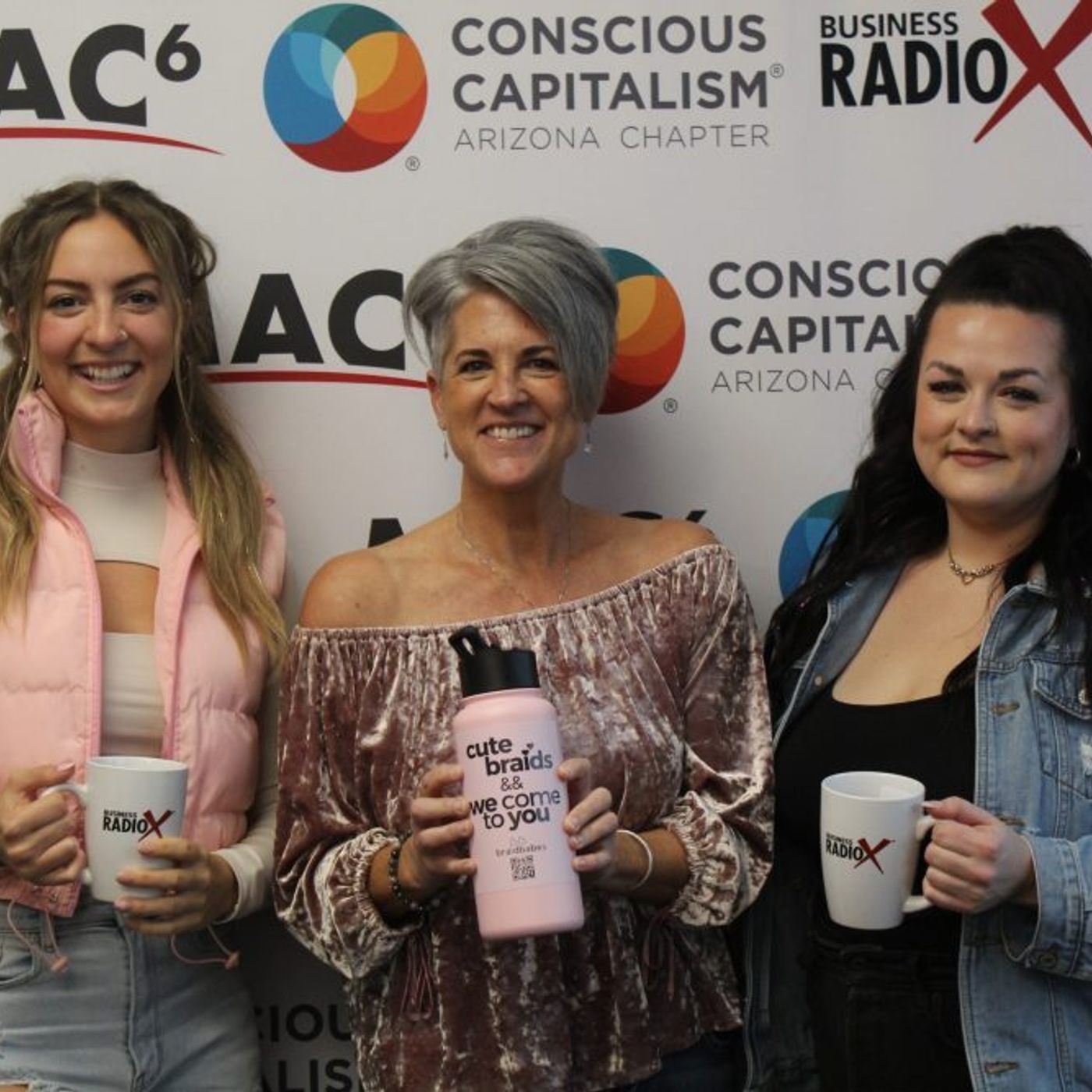 Emmily Bowman and Alex Chapman with braidbabes episode artwork