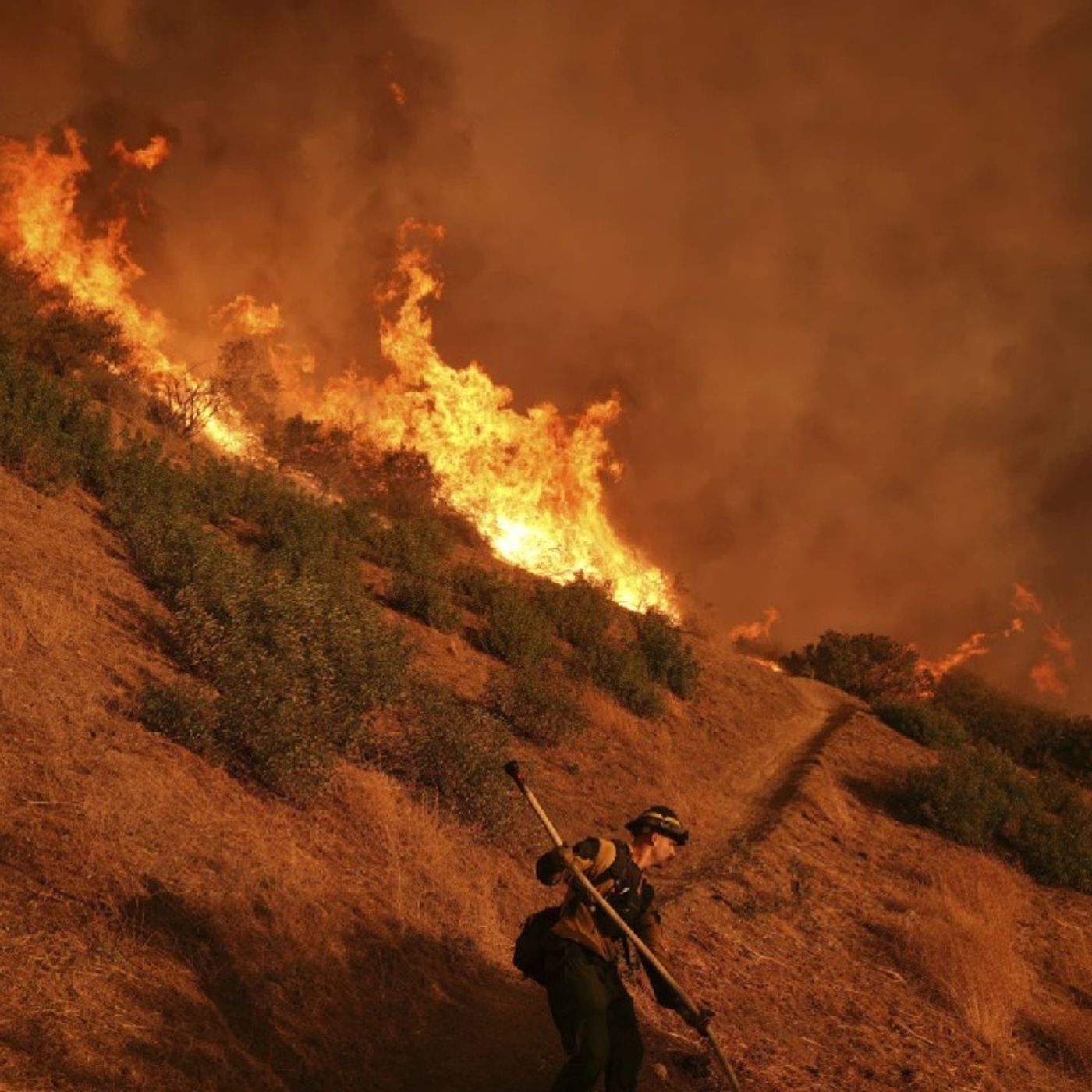 [AP] 24 dead as fire crews try to corral Los Angeles blazes before winds return this week