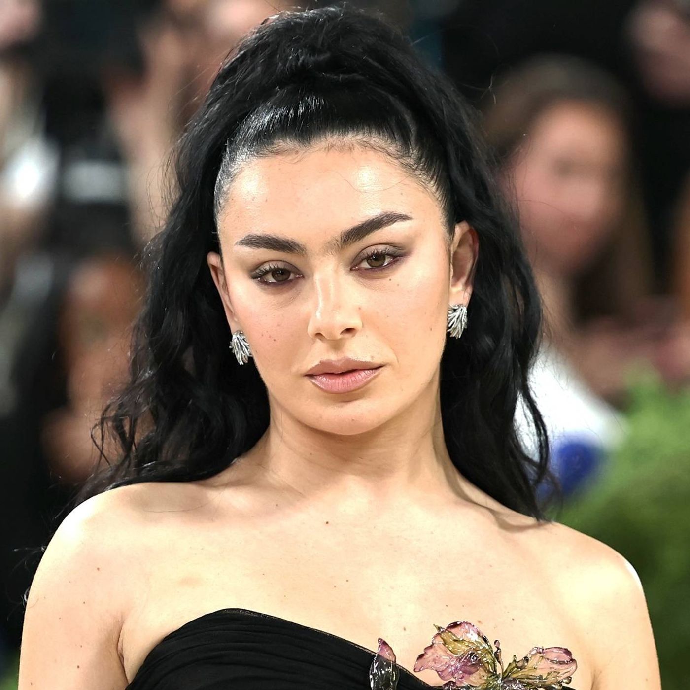 Watch Charli XCX’s raunchy video for cheeky new single ‘Wink Wink’ episode artwork