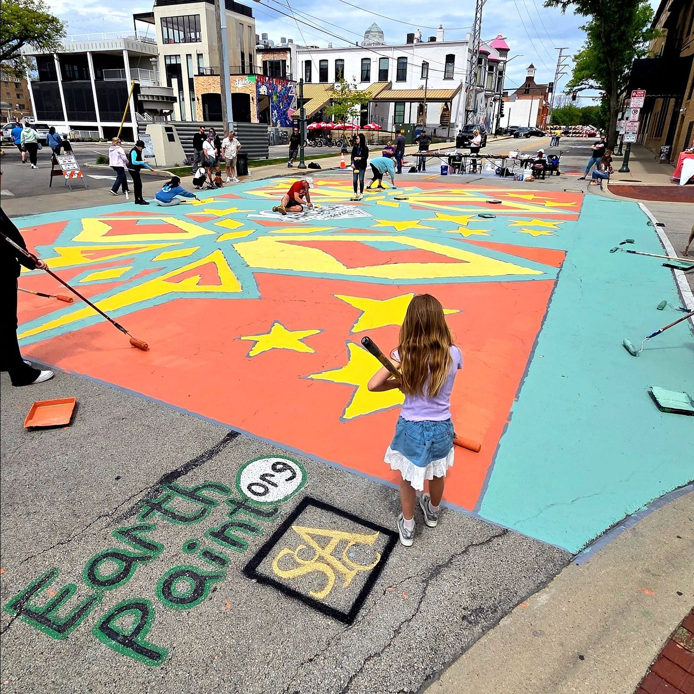 St. Charles community ‘paints the street’ for student’s visionary work episode artwork