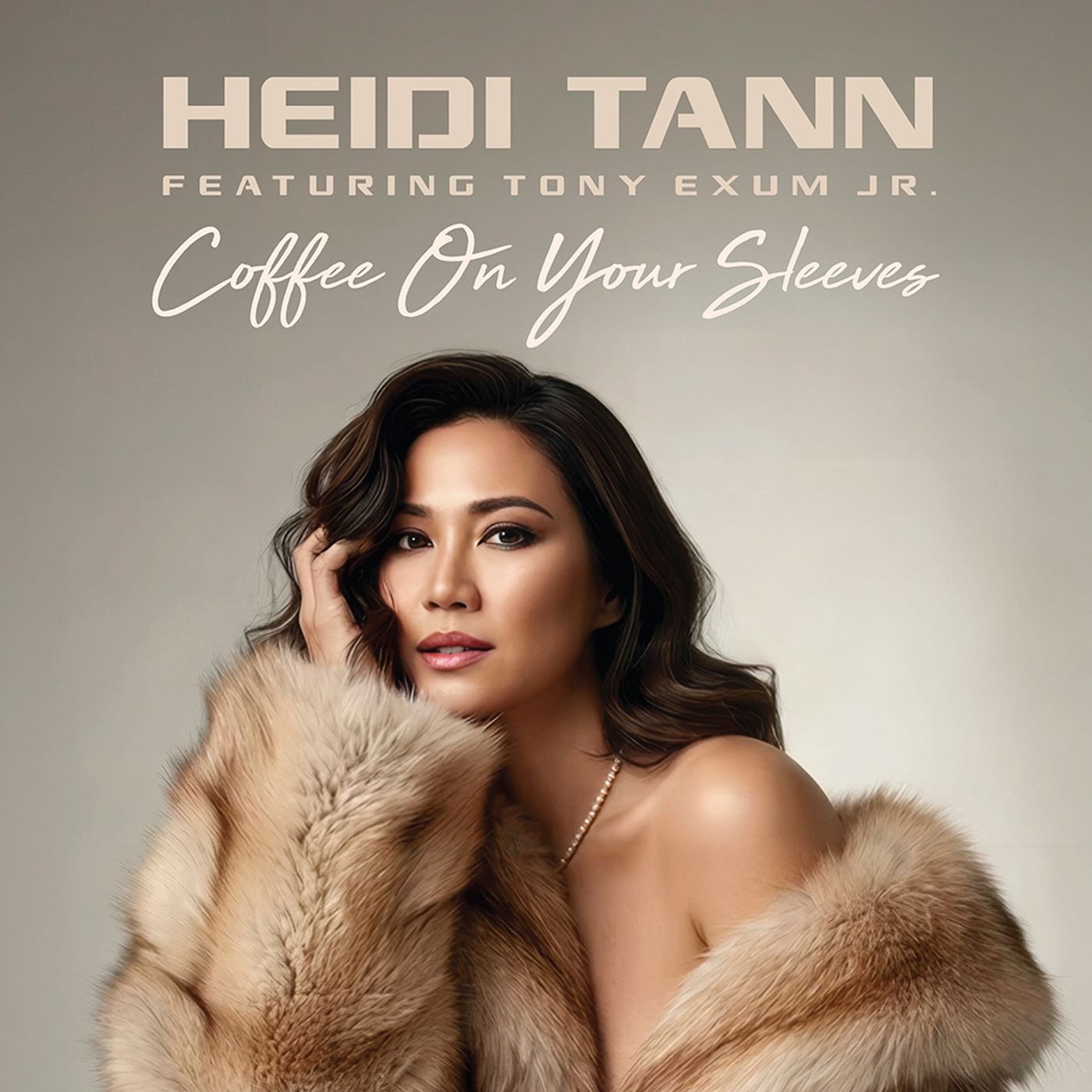 Billboard-charting contemporary smooth jazz vocalist Heidi Tann is back with “Coffee On My Sleeves” ! episode artwork