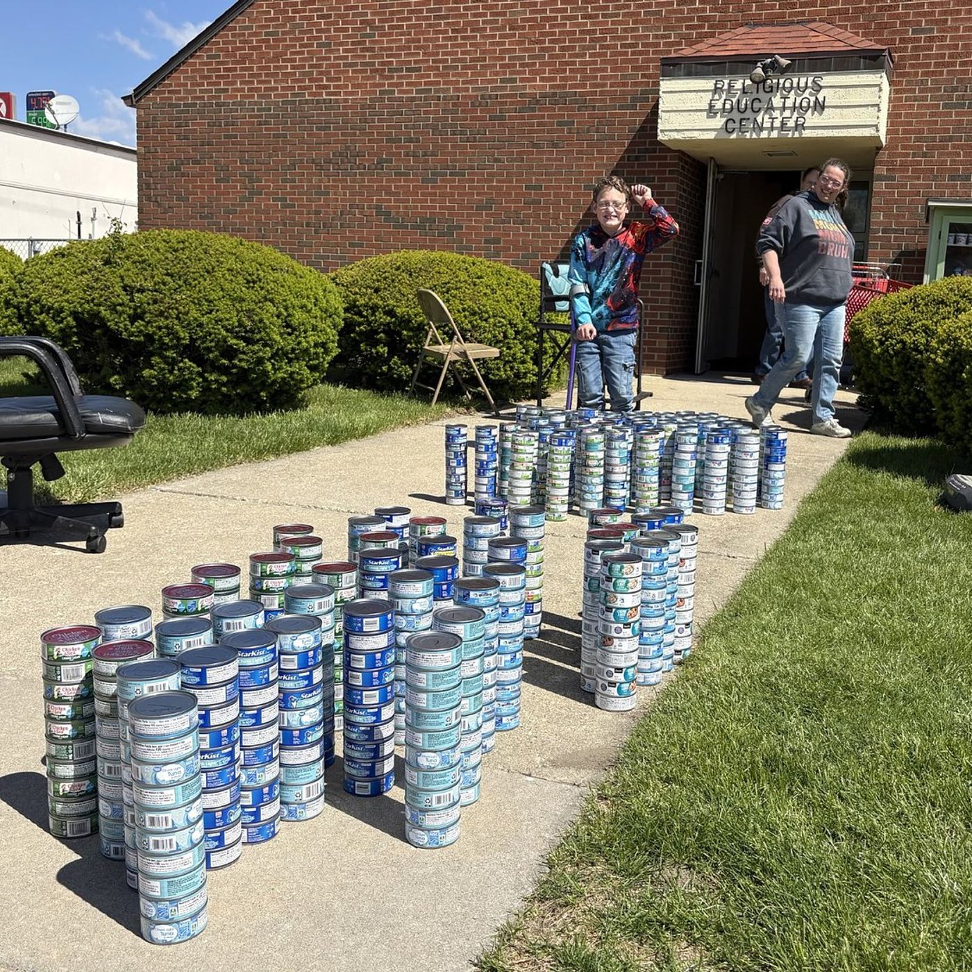 Local boy’s birthday tuna drive brings in record haul for Marseilles pantry episode artwork