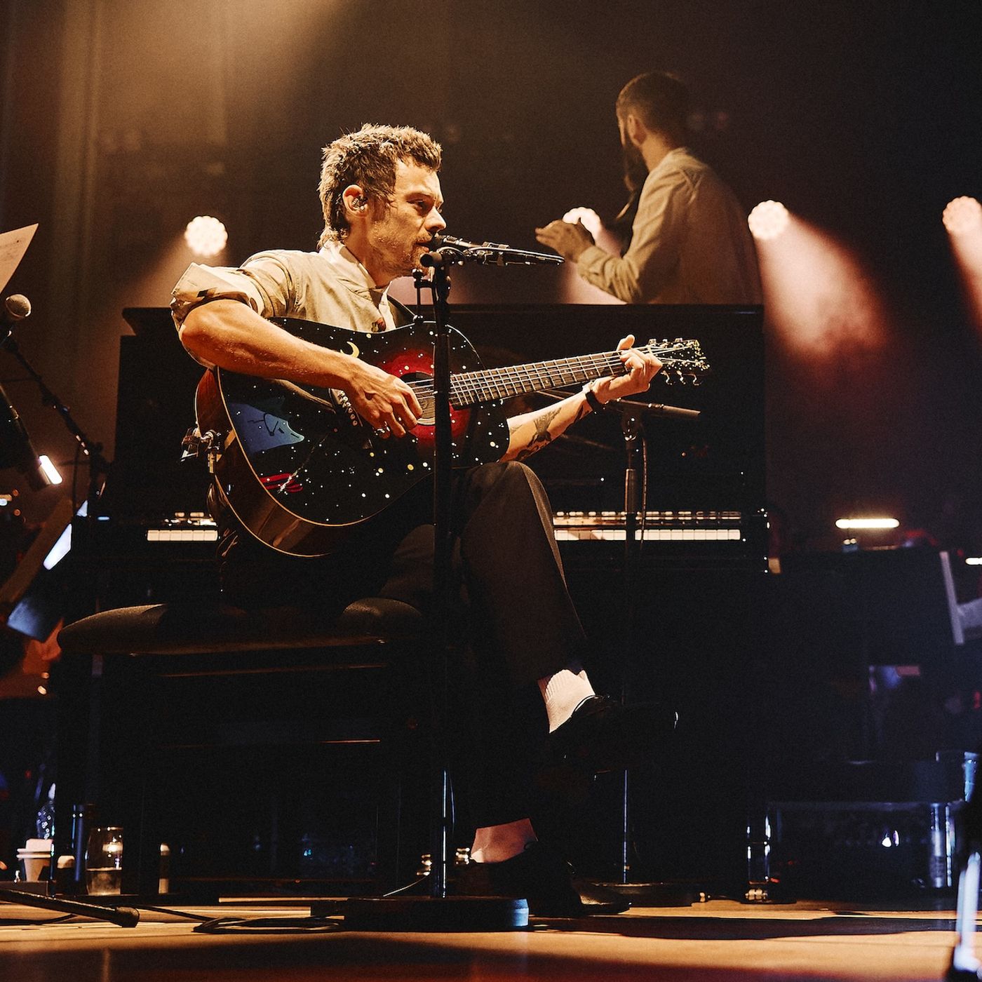 Harry Styles brings orchestral reworkings, rarities and covers to intimate Meltdown Festival show as he hails current moment as his “career