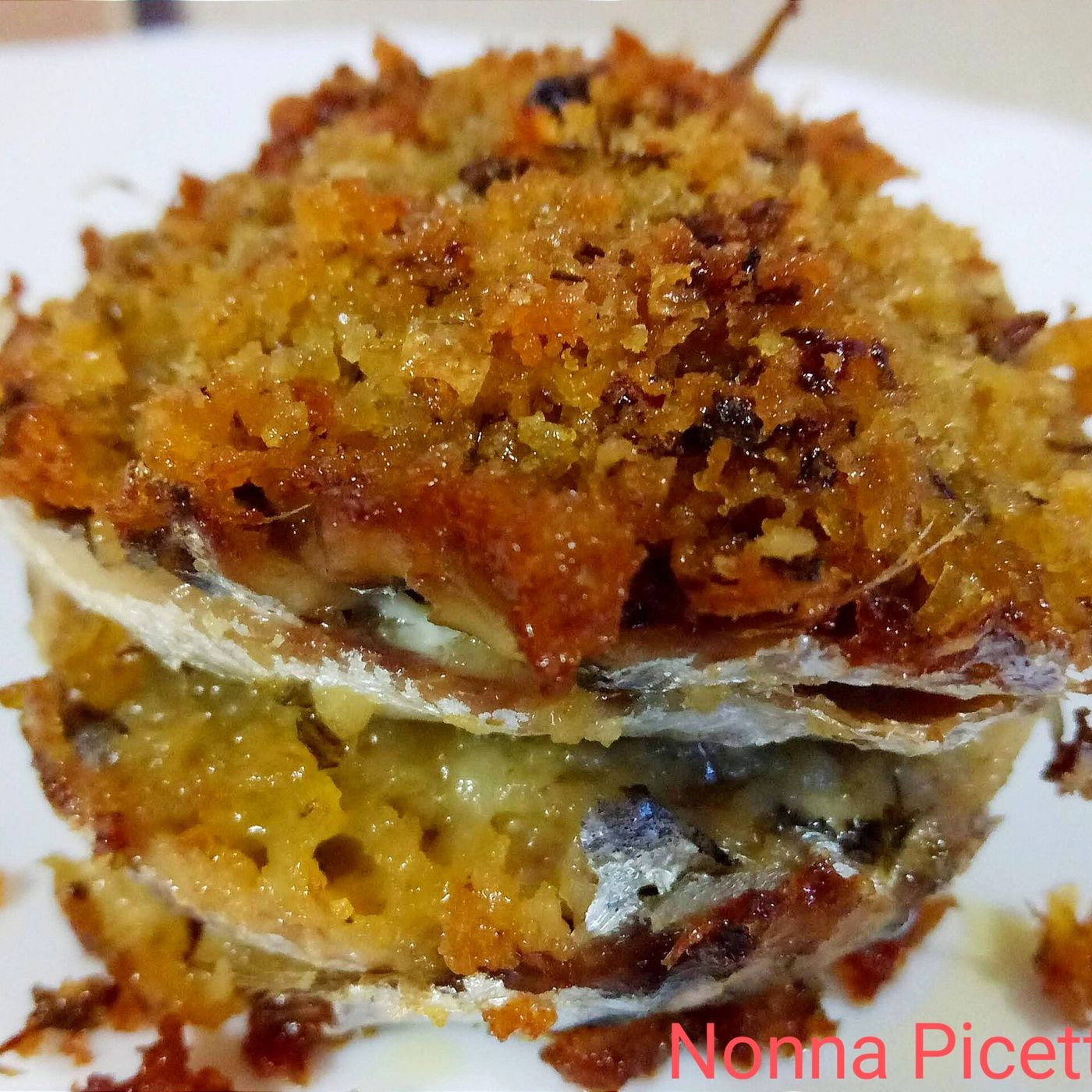 Tortini di alici con mollica gratinati al forno episode artwork
