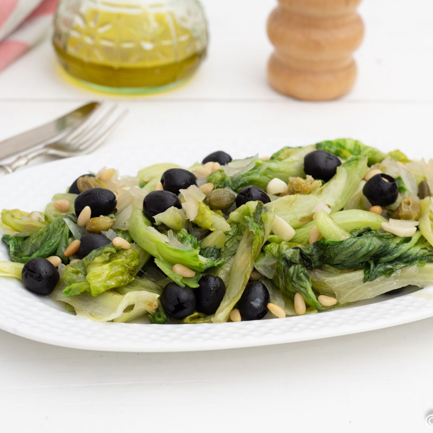 RICETTA INSALATA COTTA IN PADELLA olive e pinoli