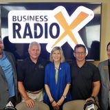 Ron Quinn and Susan Williams with Peach State Bank & Trust and Barry Zeeman with Barry's Menswear & Tuxedo