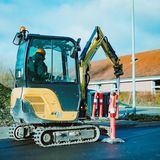 Auger for Mini Excavator and Spartan Attachments for Improved Productivity