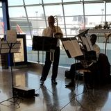 Boston Pops Brass Quintet Entertains Passengers At Logan Airport