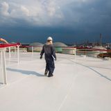 How Do Flat Roofing Contractors Improve Roof Durability