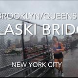 Walking across the Pulaski bridge in the rain