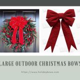 Use large outdoor Christmas bows to decorate home on Christmas day