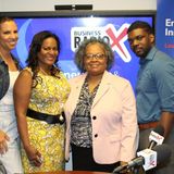Marilyn Santiago with GSU Robinson College of Business, Regina Mixon Bates with National Black MBA Association and Chaz Jenkins with Welcome
