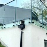 Five stunning outdoor glass balustrade ideas to transform your garden or balcony