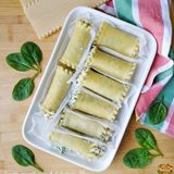 Rotolini di lasagne ricce al forno: ecco come prepararli ripieni di ricotta e spinaci!