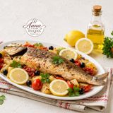 Branzino o spigola al forno con patate pomodorini e olive