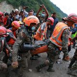 2 pulled alive from flooded Nepal tunnels, sparking hope for more rescues