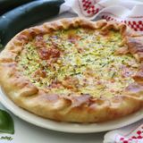 Torta salata di sfoglia integrale con zucchine e prosciutto