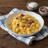Gnocchi in crema di zucca con ricotta e pancetta croccante