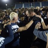Gameday I.Q.:Can a High School Football Coach participate in a post game student athlete led prayer?