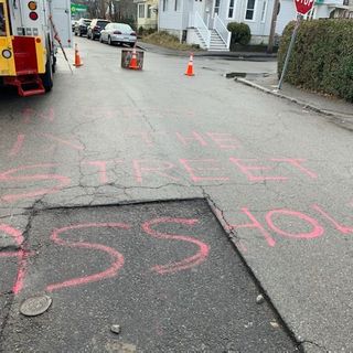 Fed-Up Quincy Resident Calls Attention To Road Issues—With Spray Paint