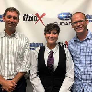 Eric Schurke and Bobbi Jo Gonnello with Moneypenny and Tyler Henry with Movement Mortgage
