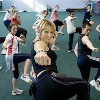 music for fitness.Sergeant L. Dower continues to whup it on with a group of exercises.by mdg
