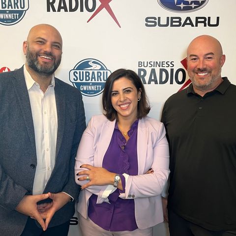 Aysha Abdullatif & Nasser Nammari with Spherion Staffing & Recruiting and Ryan Lucia with Aaron Overhead Doors & Markinuity