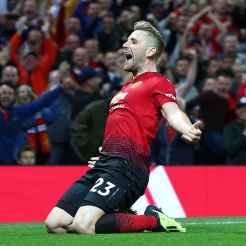 Shaw secures United win in season opener