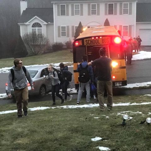School Bus Full Of Students Slides Down Icy Road