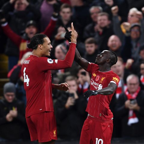 Liverpool stun City to move eight points clear