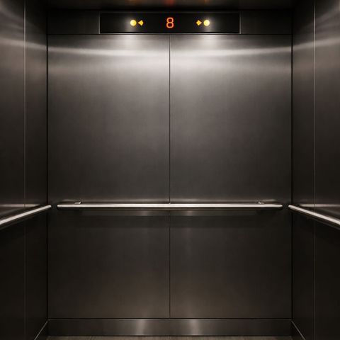 Elbows near metal rail