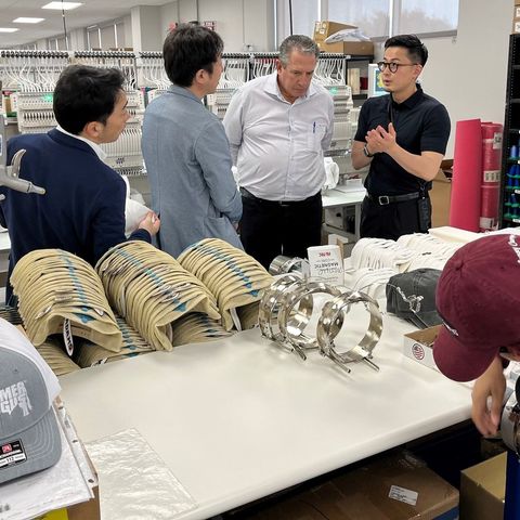 C.C. Creations owner hosts a tour of Japanese executives at the new Bryan production facility