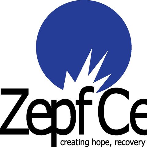 Fred talks with Deb Flores with the Zepf Center